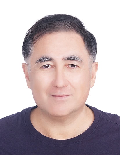 Portrait of a holistic health expert with a calm expression.